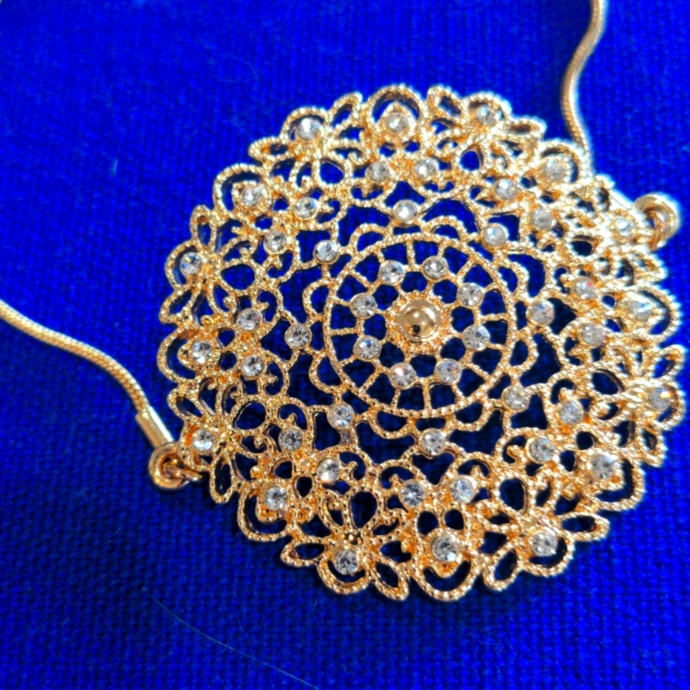 Gold With White Crystals Pull String Bracelet - image 1